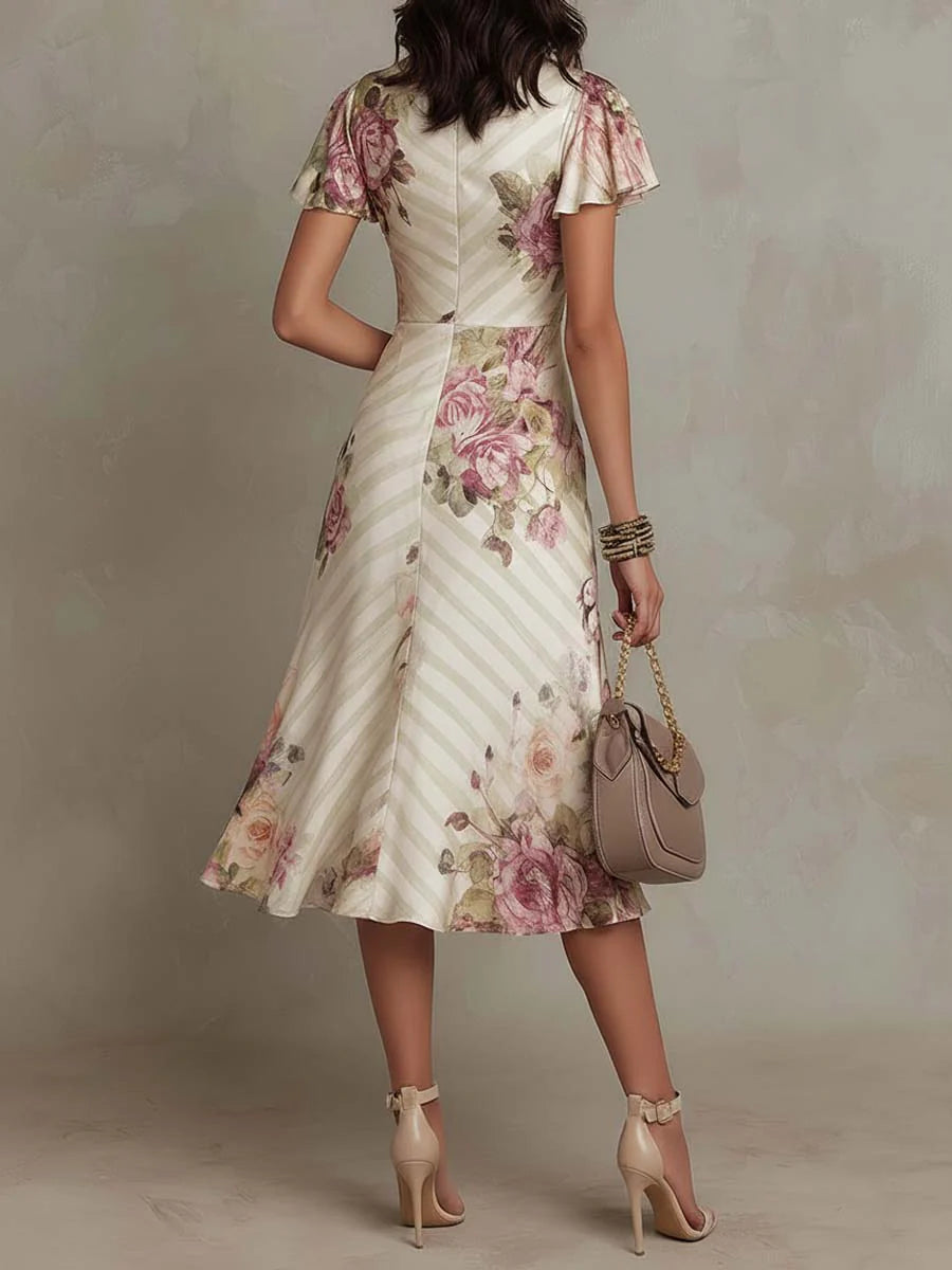 Elegant Ivory Floral Midi Dress for Women with Wrap V Neck Flutter Sleeve Ruched Flowing Style