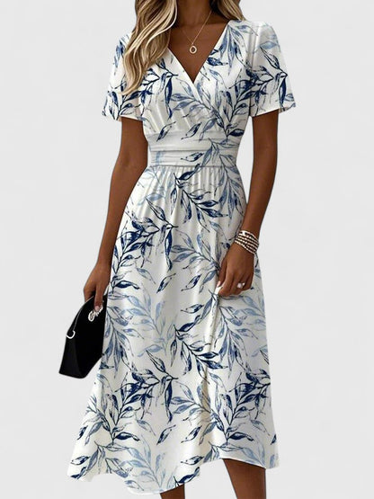 Elegant White Floral Midi Dress for Women with V Neck Flutter Sleeve Wrap Ruched Flowing Style