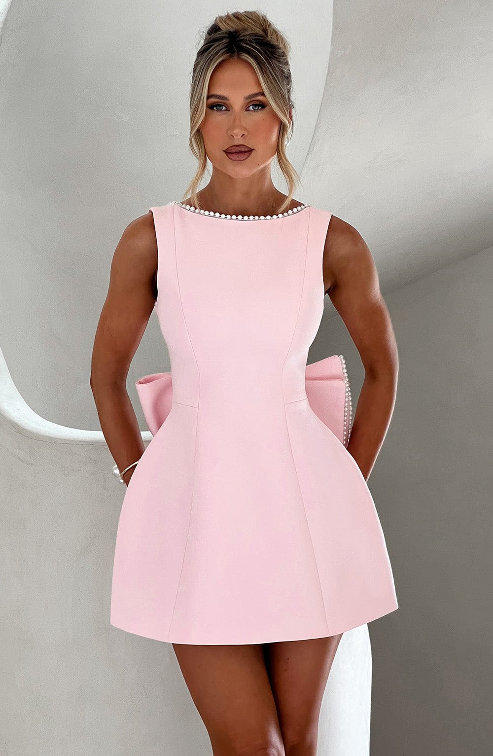Stylish Mini Dress for Women with Round Neck Sleeveless Bow Back Flared Cocktail Style