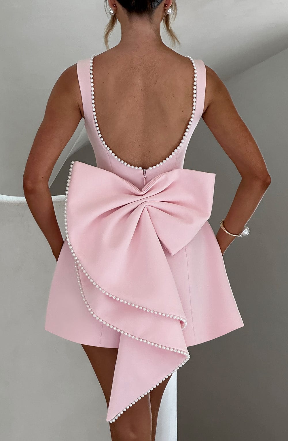 Stylish Mini Dress for Women with Round Neck Sleeveless Bow Back Flared Cocktail Style