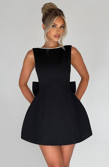 Stylish Mini Dress for Women with Round Neck Sleeveless Bow Back Flared Cocktail Style