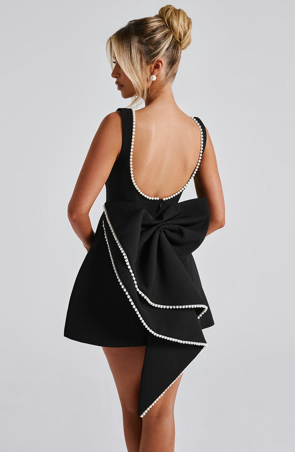 Stylish Mini Dress for Women with Round Neck Sleeveless Bow Back Flared Cocktail Style