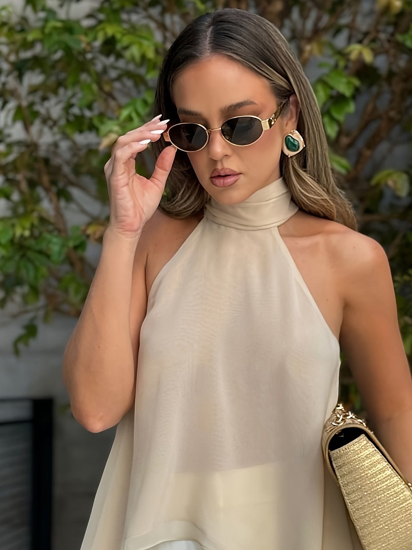 Effortless Chiffon Halter Top for Women with High Neck Sleeveless Flowing Asymmetrical Hem Style