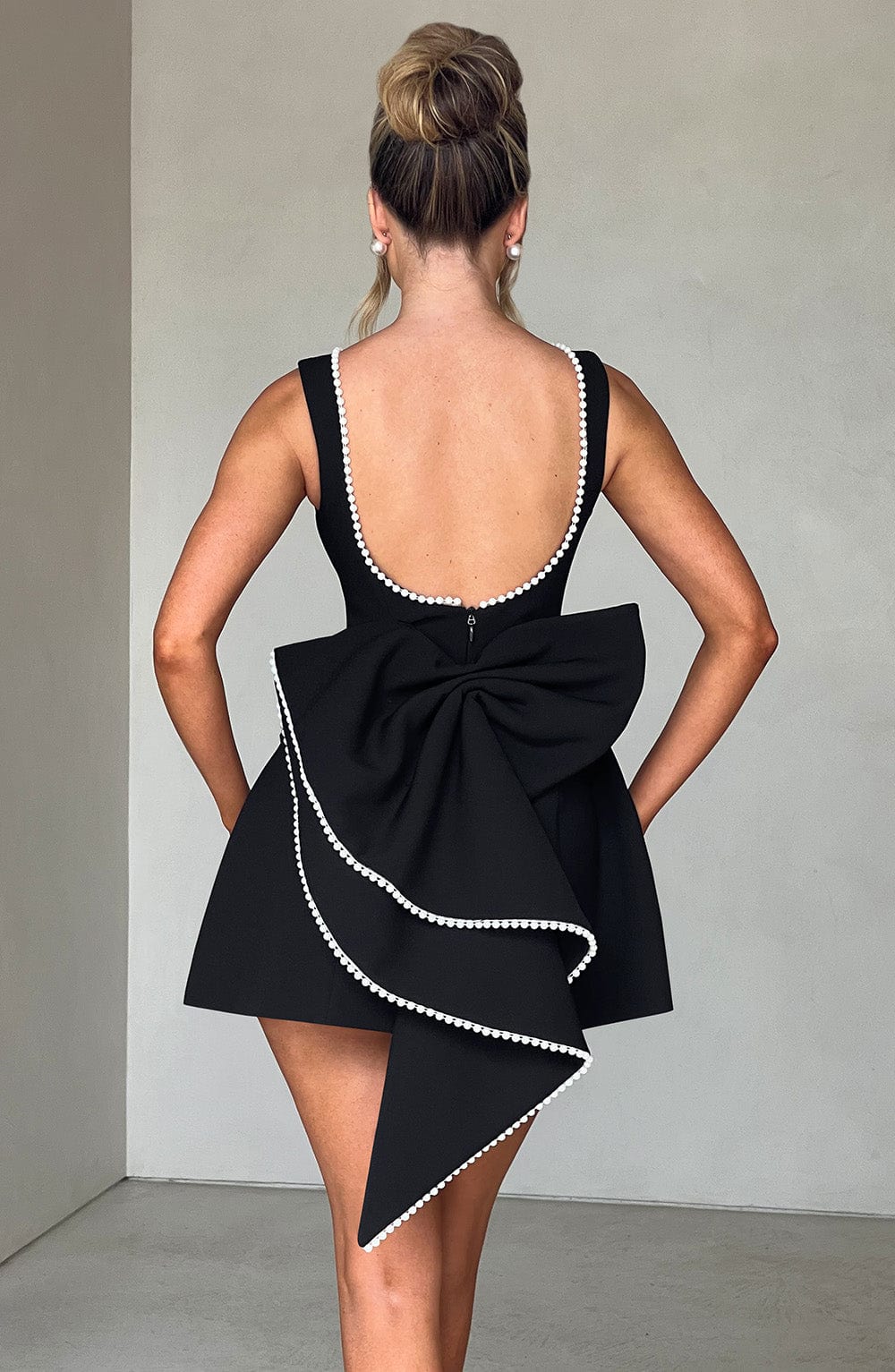 Stylish Mini Dress for Women with Round Neck Sleeveless Bow Back Flared Cocktail Style