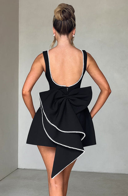 Stylish Mini Dress for Women with Round Neck Sleeveless Bow Back Flared Cocktail Style