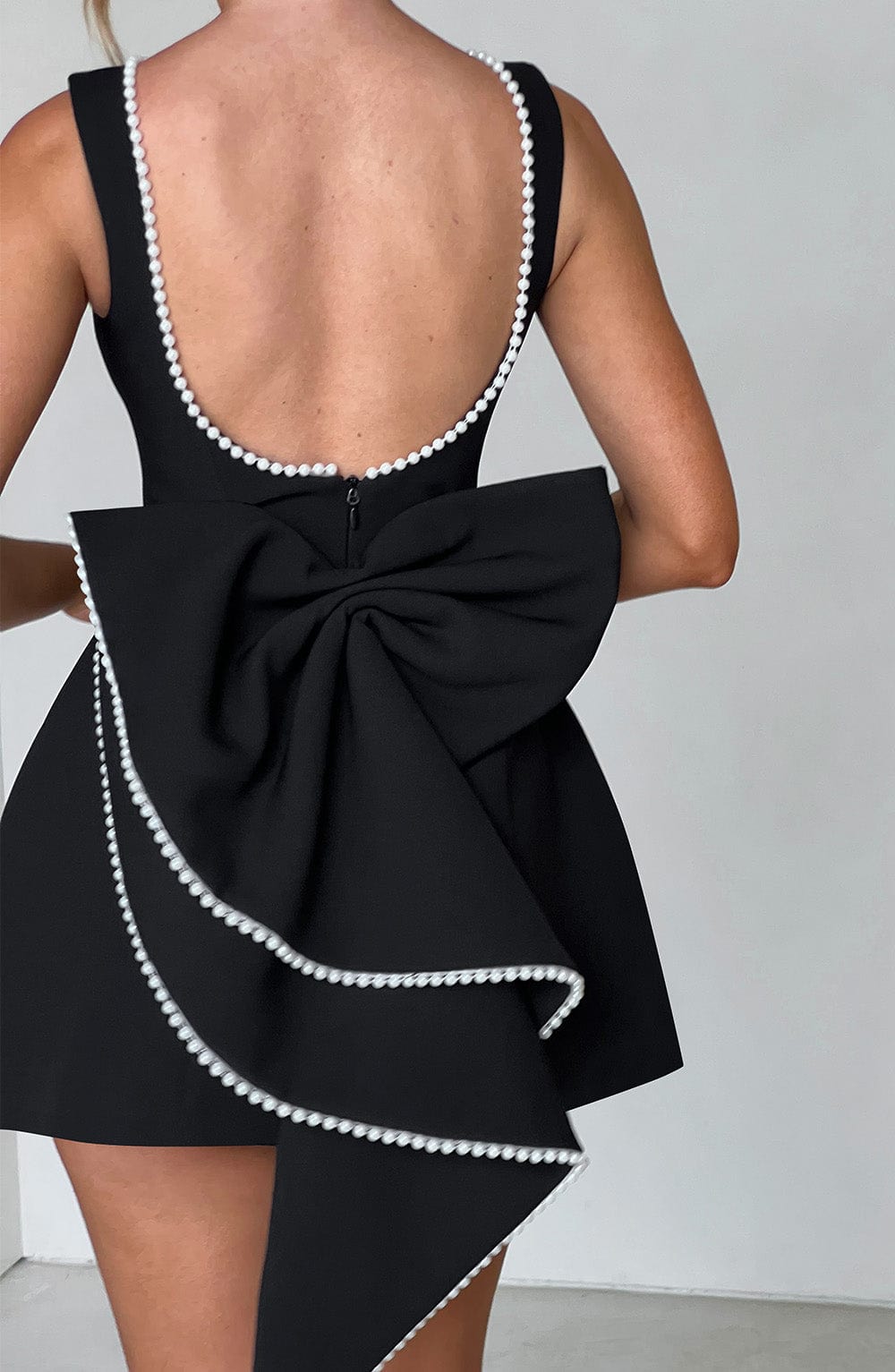 Stylish Mini Dress for Women with Round Neck Sleeveless Bow Back Flared Cocktail Style