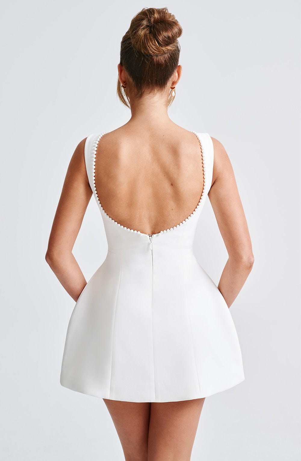 Stylish Mini Dress for Women with Round Neck Sleeveless Bow Back Flared Cocktail Style