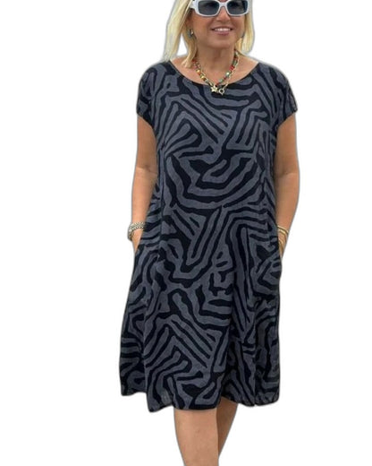 Effortless Abstract Midi Dress for Women with Crew Neck Short Sleeve Flowing Pockets Casual Style