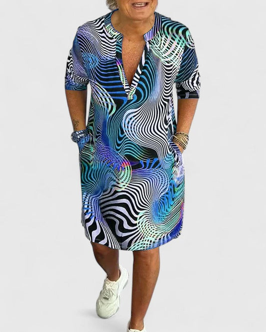 Effortless Abstract Midi Dress for Women with V Neck Short Sleeve Flowing Pockets Casual Style
