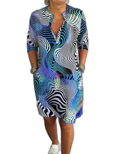 Effortless Abstract Midi Dress for Women with V Neck Short Sleeve Flowing Pockets Casual Style