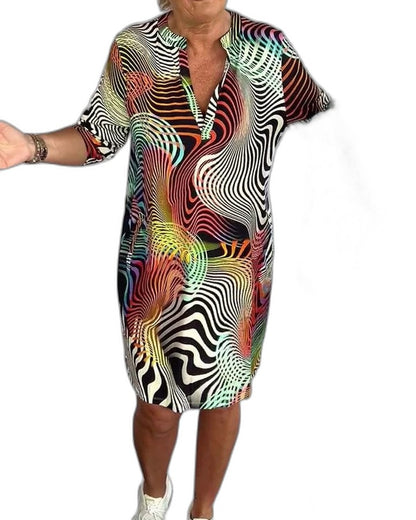 Effortless Abstract Midi Dress for Women with V Neck Short Sleeve Flowing Pockets Casual Style