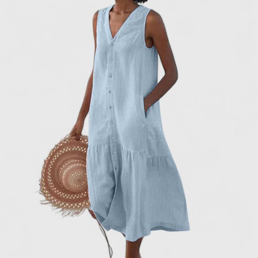 Effortless Blue Denim Jumpsuit for Women with V Neck Sleeveless Button Front Flowing Pockets Casual Style