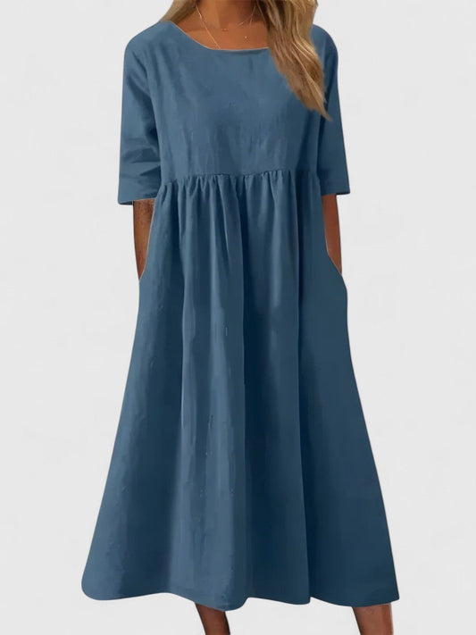 Effortless Blue Denim Midi Dress for Women with Crew Neck Short Sleeve A Line Flowing Pockets Casual Style