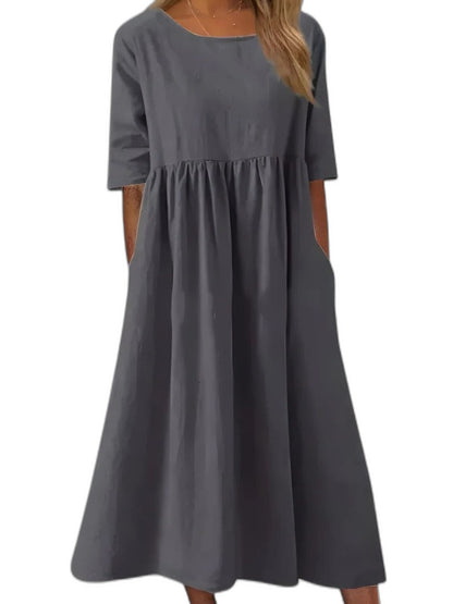 Effortless Blue Denim Midi Dress for Women with Crew Neck Short Sleeve A Line Flowing Pockets Casual Style
