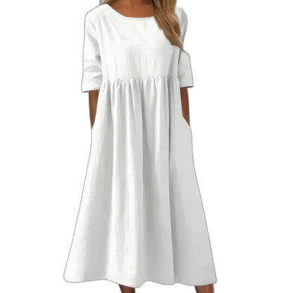 Effortless Blue Denim Midi Dress for Women with Crew Neck Short Sleeve A Line Flowing Pockets Casual Style