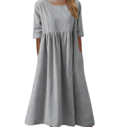 Effortless Blue Denim Midi Dress for Women with Crew Neck Short Sleeve A Line Flowing Pockets Casual Style