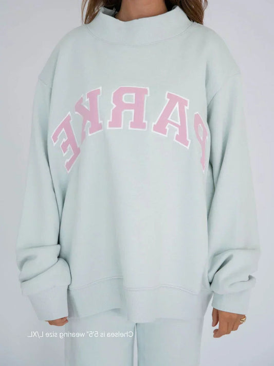 Effortless Blue Knit Sweater for Women with High Neck Long Sleeve Oversized Casual Style
