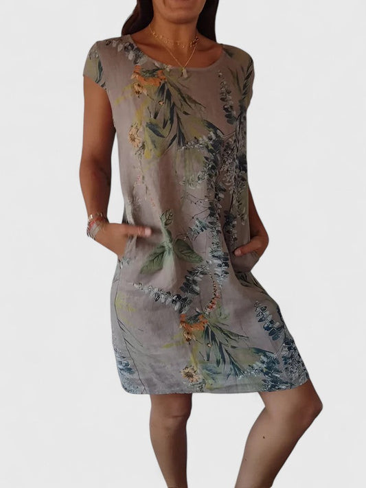 Effortless Floral Midi Dress for Women with Crew Neck Short Sleeve Flowing Pockets Casual Style