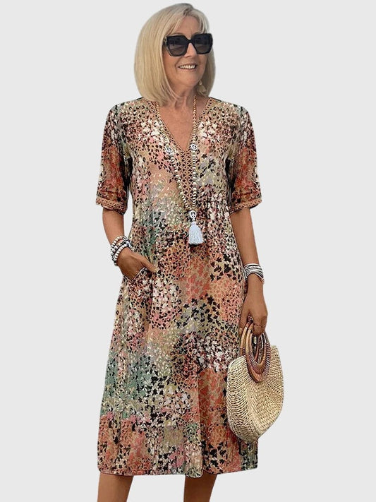 Effortless Floral Midi Dress for Women with V Neck Elbow Sleeve Flowing Pockets Casual Style