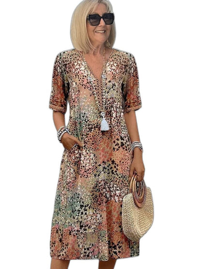 Effortless Floral Midi Dress for Women with V Neck Short Sleeve Flowing Pockets Casual Style