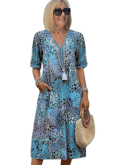 Effortless Floral Midi Dress for Women with V Neck Short Sleeve Flowing Pockets Casual Style