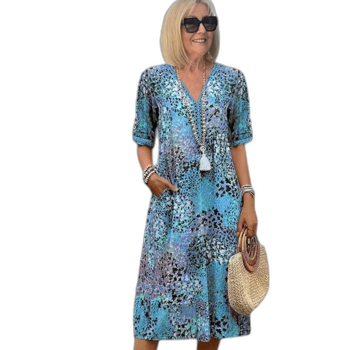 Effortless Floral Midi Dress for Women with V Neck Short Sleeve Tiered Flowing Pockets Casual Style