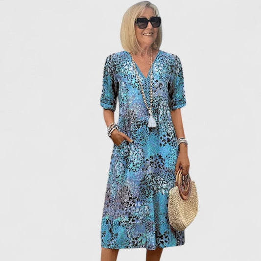 Effortless Floral Midi Dress for Women with V Neck Short Sleeve Tiered Flowing Pockets Casual Style
