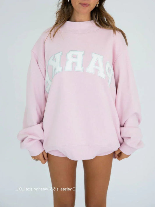 Effortless Pink Knit Sweater for Women with Crew Neck Long Sleeve Oversized Casual Style