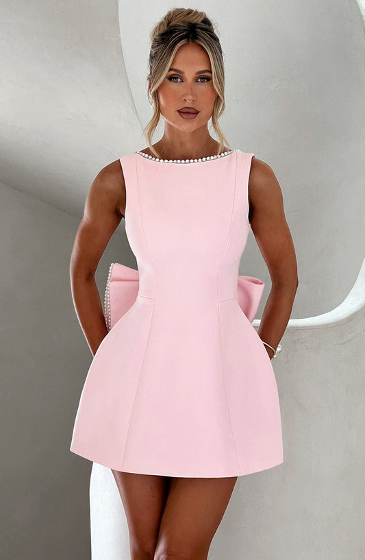 Elegant Pink Mini Dress for Women with Boat Neck Sleeveless Fit And Flare Pockets Party Style